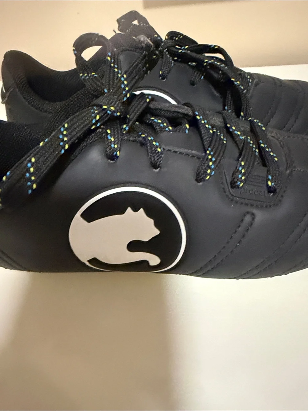 Puma Kids Black Athletic Cleats with Multicolor Speckled Laces